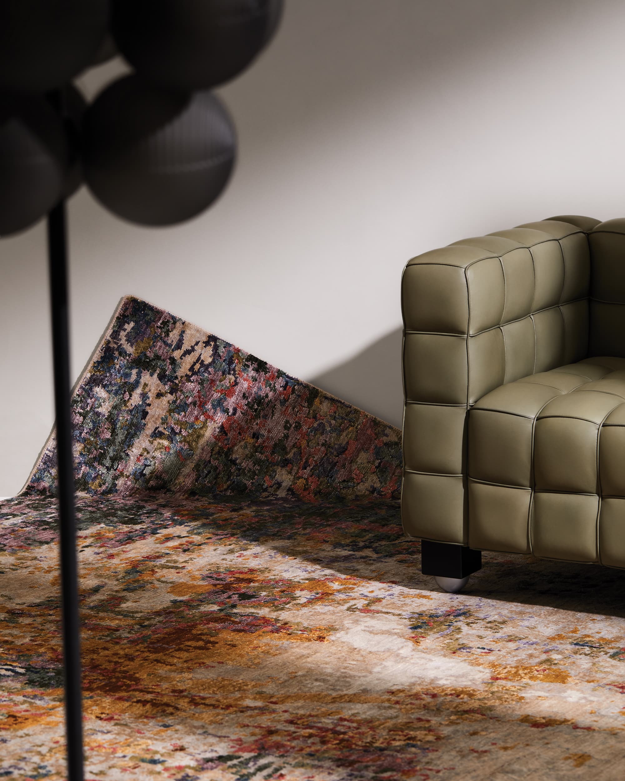 Hand-knotted rugs displayed on a wall