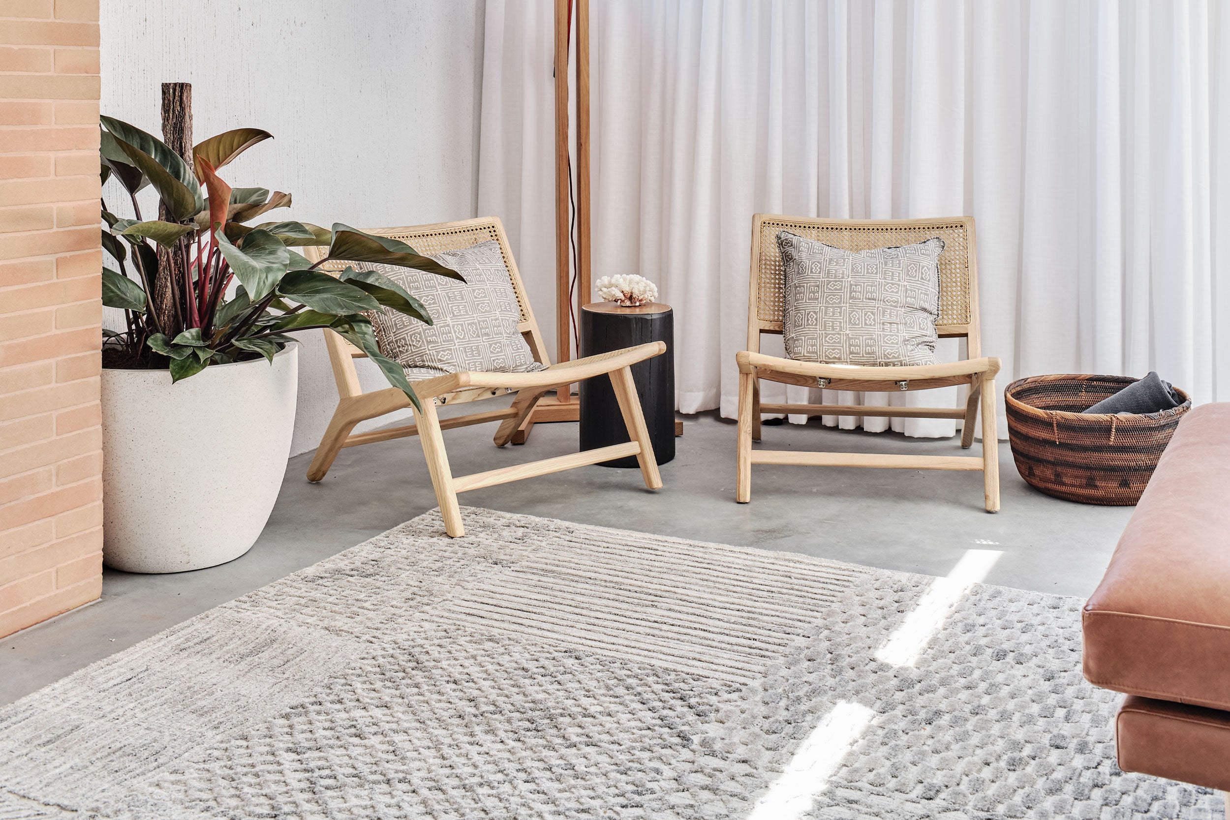 Beautifully styled room with a Tribe Home rug